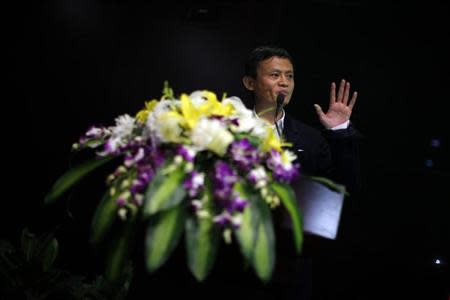 Jack Ma, chairman of China's largest e-commerce firm Alibaba Group, delivers an speech during a corporate event at the company's headquarters on the outskirts of Hangzhou, Zhejiang province April 23, 2013. REUTERS/Carlos Barria