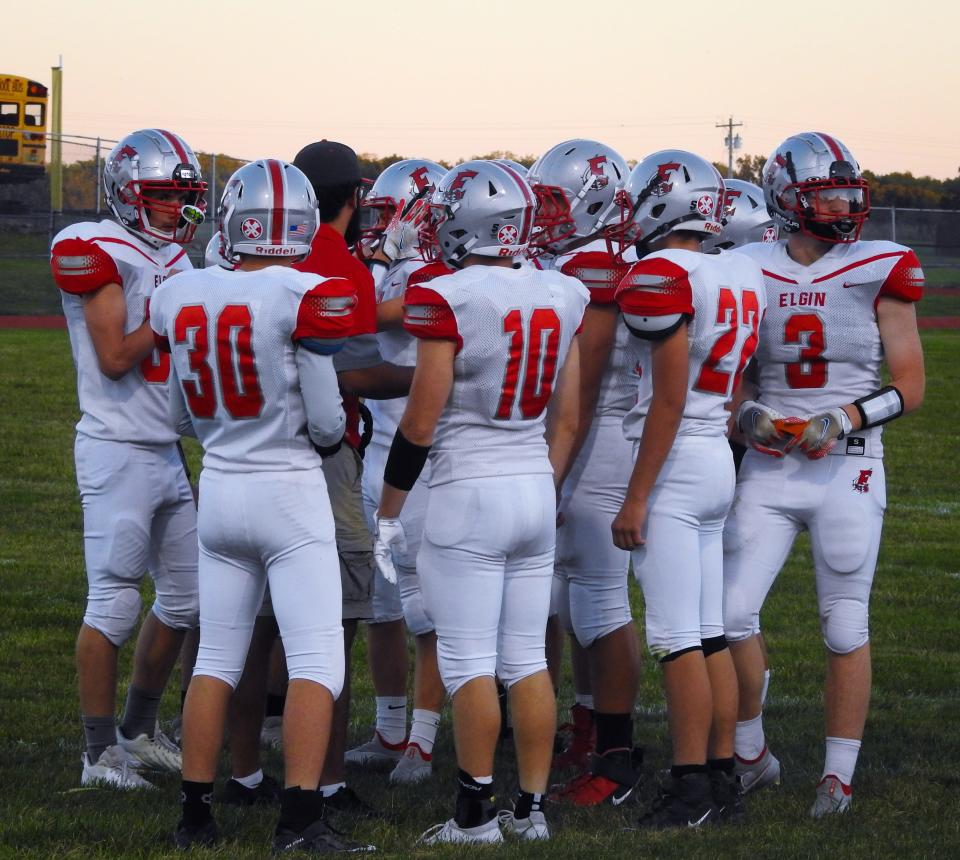 Elgin's football team gathers at Ridgedale last season in a Northwest Central Conference football game.