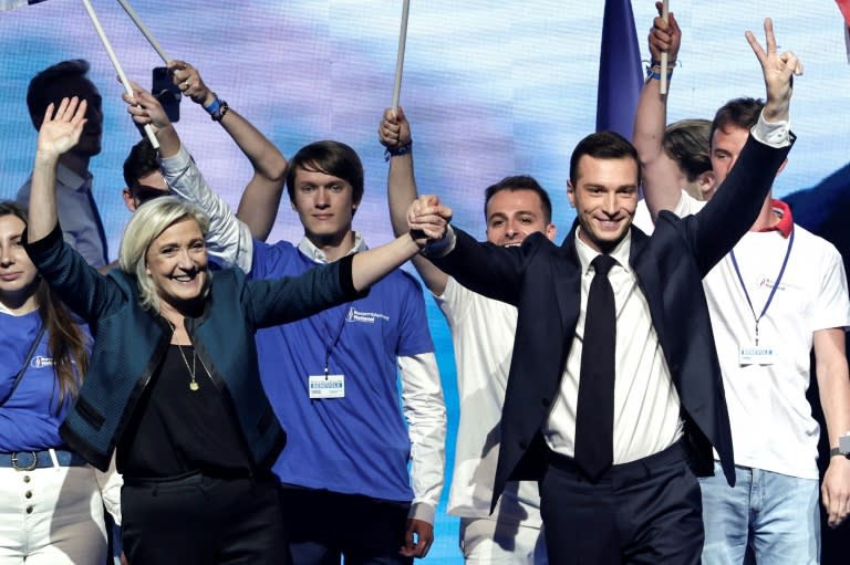 Jordan Bardella, right, is expected to lead the far-right National Rally to first place (STEPHANE DE SAKUTIN)