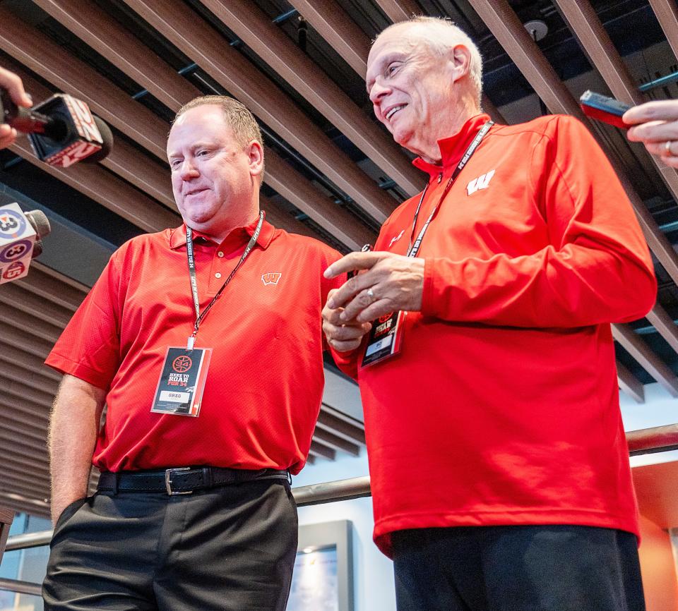 Current Wisconsin head coach Greg Gard, left, and his predecessor, Bo Ryan, speak about former assistant Howard Moore at a fundraiser Saturday in Madison.