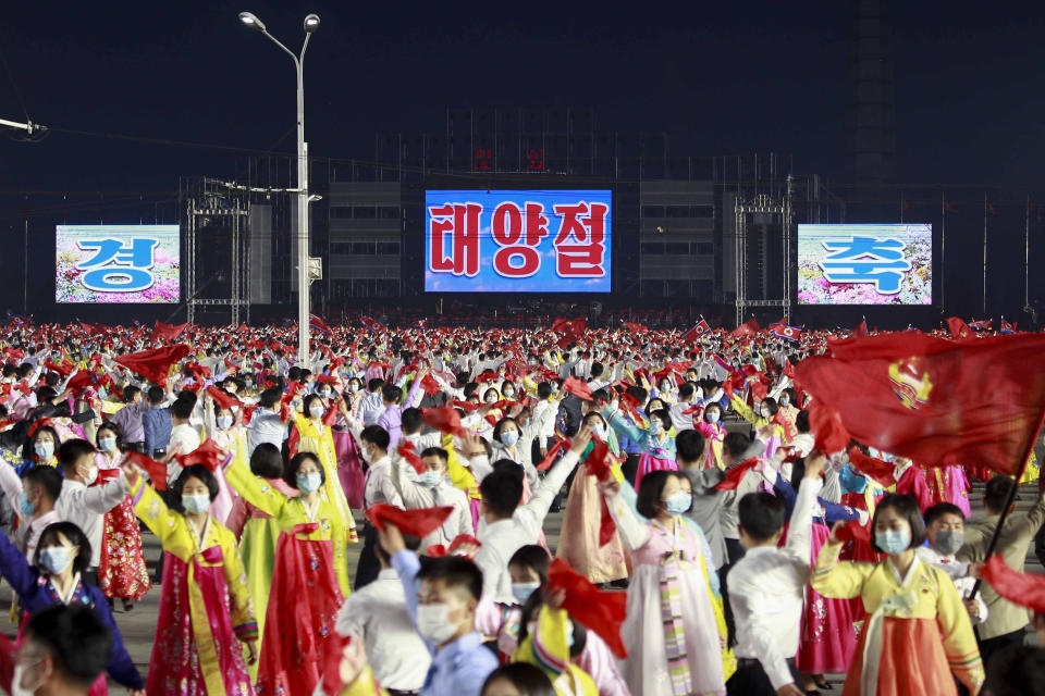 Students and youth attend a dancing party in celebration of the 110th birth anniversary of its late founder Kim Il Sung at Kim Il Sung Square in Pyongyang, North Korea Friday, April 15, 2022. (AP Photo/Cha Song Ho)