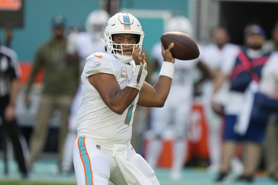 Miami Dolphins quarterback Tua Tagovailoa (1) looks to pass the ball during the first half of an NFL football game against the Cleveland Browns, Sunday, Nov. 13, 2022, in Miami Gardens, Fla. (AP Photo/Lynne Sladky)