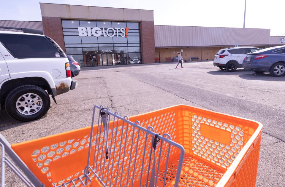 A shopper leaves Big Lots at Meyers Lake Plaza in Canton Township. Rumors have circulated for months that MGM Resorts is buying the plaza. The plaza owners say it's not true.