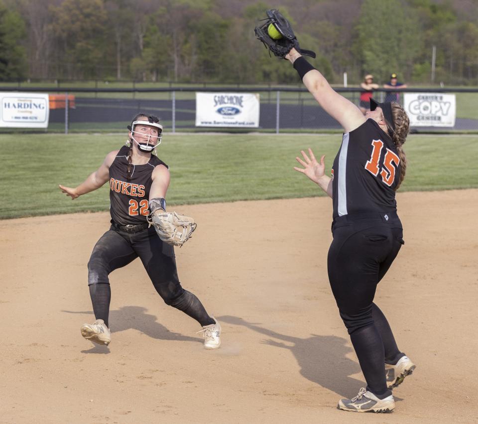 Marlington’s Emma Jackson makes a catch near third base in front of Audrey Miller for an out against Streetsboro in a Division II sectional final, Thursday, May 12, 2022.