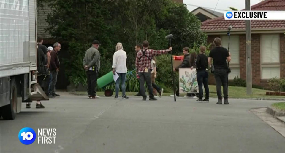 Neighbours cast filming a scene on Ramsay Street.