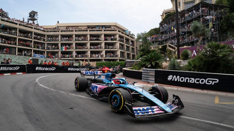 A photo of Esteban Ocon racing his Alpine F1 car in Monaco. 