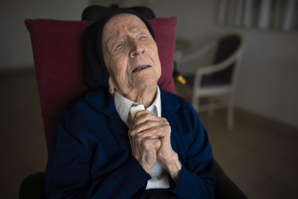 Sister Andre poses for a portrait at the Sainte Catherine Laboure care home in Toulon, southern France, Wednesday, April 27, 2022. The French nun who was believed to be the world's oldest person died at 118 in her sleep early Tuesday Jan.17, 2023, the spokesperson for her nursing home in Toulon, David Tavella, said Wednesday. (AP Photo/Daniel Cole, File)