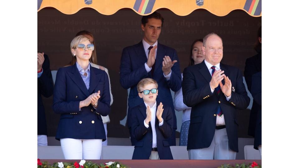 Prince Jacques with his parents clapping in sunnies