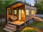 <p>This 196-square-foot house near Boise, Idaho, is home to Macy Miller, her partner James, their daughter Hazel, and their Great Dane, Denver. A 27-year-old architect, Macy designed the home from scratch and built it on a 24-foot flatbed with help from friends and family. Clad in siding made of recycled pallet wood, the minimalist home is flooded with light and feels spacious despite its size. Hidden storage under the bed, above the pantry, and behind the fridge are contrasted with open shelving in the kitchen to make the space feel bigger. In total, Macy spent about $11,000 on her tiny house and is now able to live rent- and mortgage-free.</p><p><strong><a class="link " href="http://minimotives.com/pro-photos/" rel="nofollow noopener" target="_blank" data-ylk="slk:SEE INSIDE;elm:context_link;itc:0;sec:content-canvas">SEE INSIDE</a></strong></p>