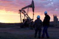 An oil well is pictured at sunrise in the Bakken oil fields near Sidney, Montana in this November 2014 handout photo. REUTERS/Smithsonian Channel/Handout via Reuters