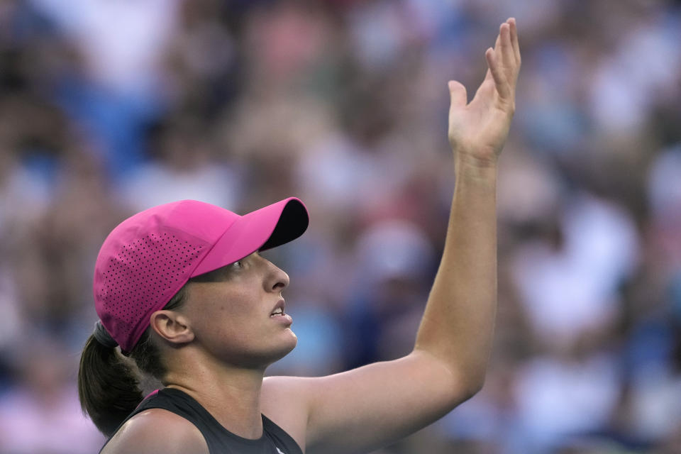 Iga Swiatek of Poland gestures during her third round match against Linda Noskova of the Czech Republic at the Australian Open tennis championships at Melbourne Park, Melbourne, Australia, Saturday, Jan. 20, 2024. (AP Photo/Andy Wong)