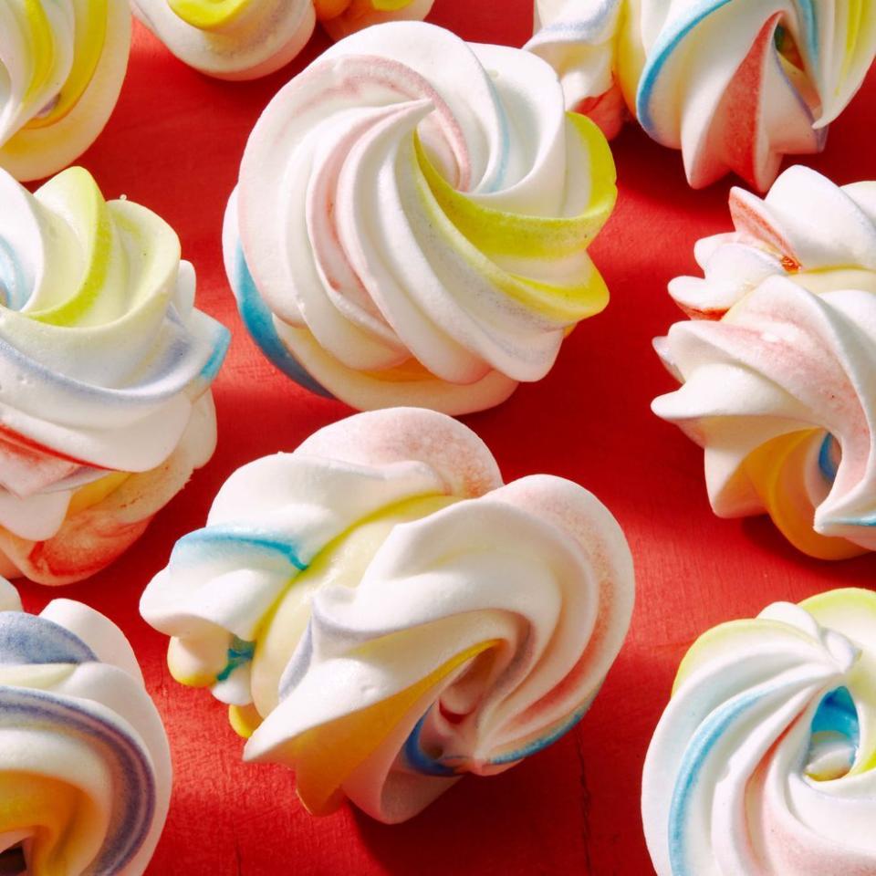 <p>These are a showstopper! Dainty meringues will wow your guests with their intricate designs and vibrant colors. </p><p>Get the <strong><a href="https://www.goodhousekeeping.com/food-recipes/dessert/a39397781/rainbow-meringue-sandwiches-recipe/" rel="nofollow noopener" target="_blank" data-ylk="slk:Rainbow Meringue Sandwiches recipe;elm:context_link;itc:0" class="link ">Rainbow Meringue Sandwiches recipe</a></strong>. </p>
