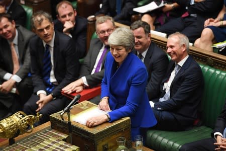 Theresa May speaks on her last day in office as Britain's Prime Minister, at the House of Commons in London