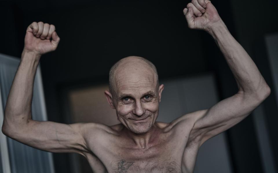 A solider who was held captive poses for a photograph. Names of the men were not disclosed.