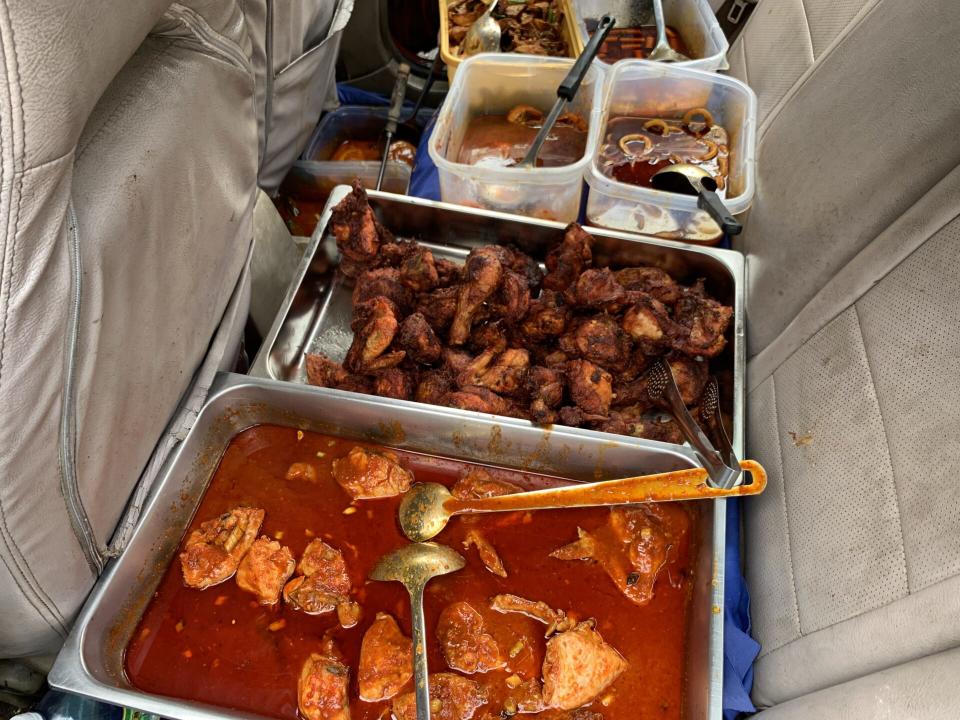 Wak Nasi Campur - Dishes in the back seat