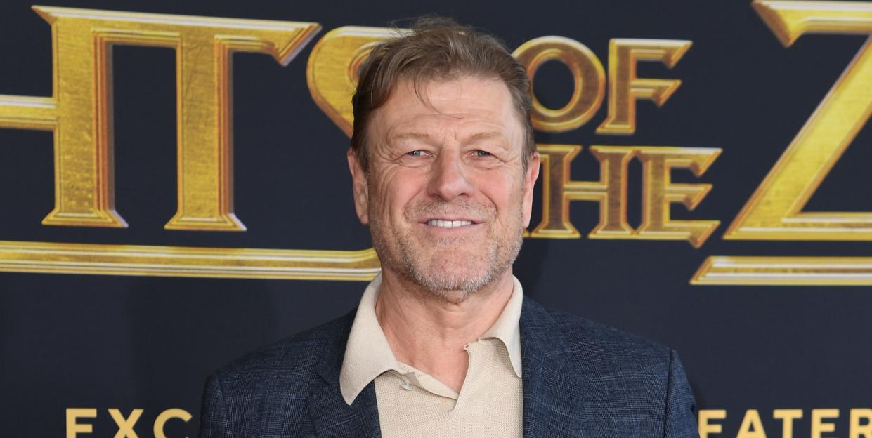 sean bean poses on on the red carpet at the premiere of knights of the zodiac in may 2023