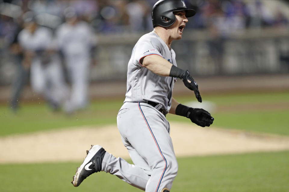 Miami Marlins' Tyler Heineman reacts after hitting a two-run home run during the eighth inning of a baseball game against the New York Mets, Thursday, Sept. 26, 2019, in New York. (AP Photo/Kathy Willens)