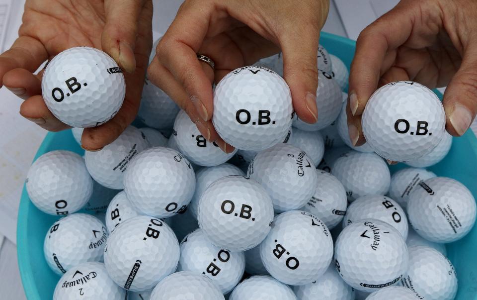 Golfers participating in the first Owen Bingham Memorial Golf Tournament received golf balls bearing the initials of the Dover-Sherborn golfer on June 22.