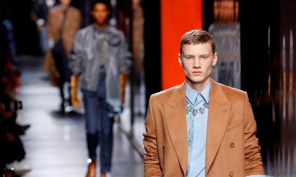 A model presents a creation for Dior Homme during the men’s autumn-winter collection in Paris