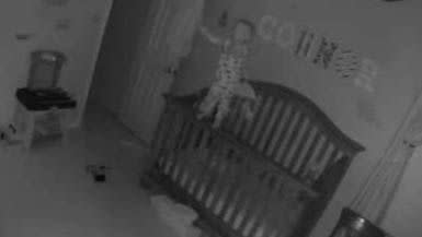 With his head turning from side-to-side, the baby screams for his mother. Photo: YouTube