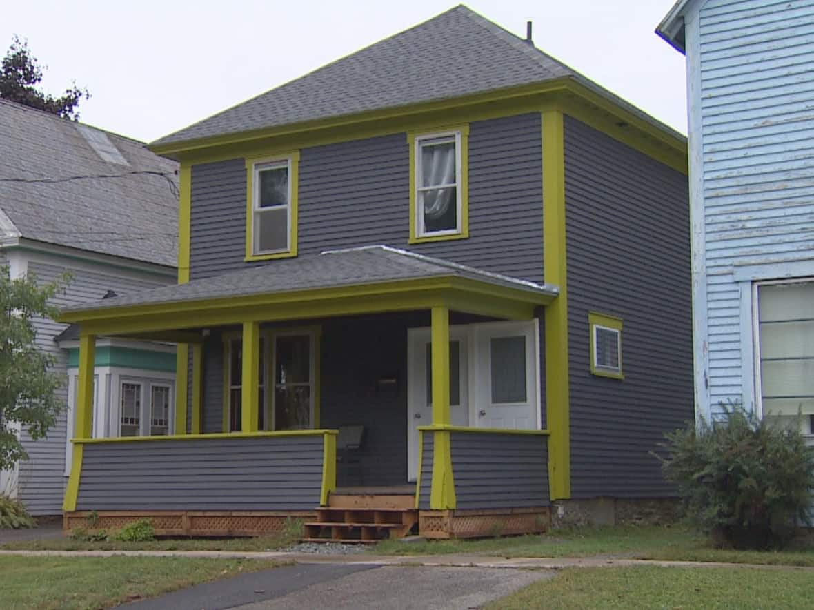 The Aberdeen Street home, aptly named Mim’s House, will house two formerly homeless individuals in the upper and lower floor one-bedroom apartments.    (Edwin Hunter/CBC - image credit)