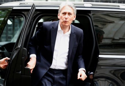 Britain's Chancellor of the Exchequer Philip Hammond arrives in Downing Street, London, April 24, 2018. REUTERS/Henry Nicholls