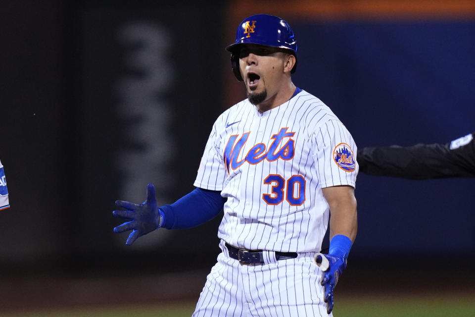New York Mets' Rafael Ortega celebrates after hitting an RBI single against the Miami Marlins during the eighth inning of a baseball game Thursday, Sept. 28, 2023, in New York. (AP Photo/Frank Franklin II)