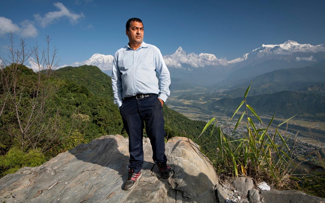 Devi Lal Parajuli, 42, was unable to pay for his 12-year-old son's pneumonia treatment when Mercury MENA stopped paying his wages. He is owed QR9,345 (£1,985) - Simon Townsley