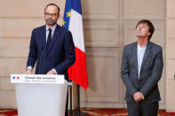 French Prime Minister Edouard Philippe (L) and French Minister of the Ecological and Social Transition Nicolas Hulot (R) announce the French government's official decision to abandon the Grand Ouest Airport (AGO) project in Notre-Dame-des-Landes following the weekly cabinet meeting at the Elysee Palace in Paris, France, January 17, 2018. REUTERS/Charles Platiau