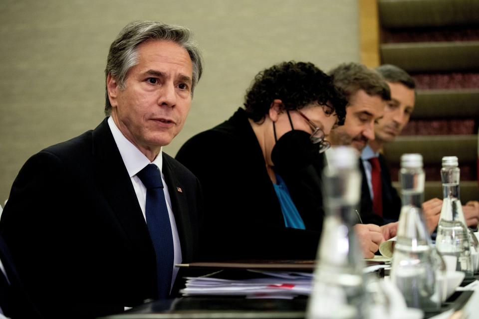 U.S. Secretary of State Antony Blinken meets with Argentine Foreign Minister Santiago Cafiero during the G-20 Foreign Ministers Summit in Nusa Dua, on Indonesia's resort island of Bali Friday, July 8, 2022. (Stefani Reynolds/Pool Photo via AP)