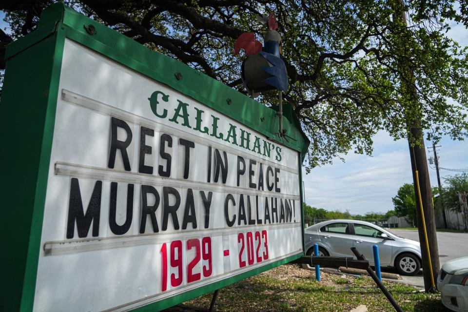 A sign dedicated to Murray Callahan is displayed outside Callahan's General Store on Monday, two days after Callahan died at age 93.