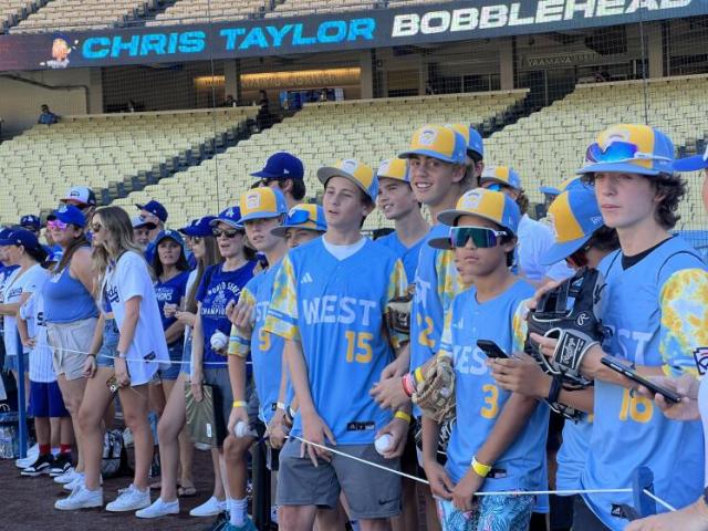 Little Leaguers greet Major League Baseball players