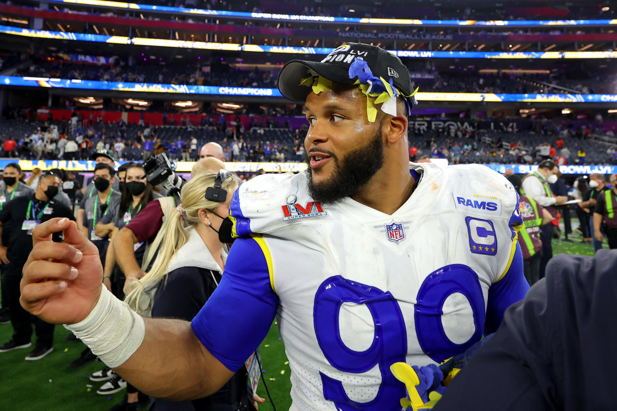 Aaron Donald #99 of the Los Angeles Rams celebrates after defeating the Cincinnati Bengals during Super Bowl LVI at SoFi Stadium on February 13, 2022 in Inglewood, California. The Los Angeles Rams defeated the Cincinnati Bengals 23-20.  (Photo by Kevin C. Cox/Getty Images)