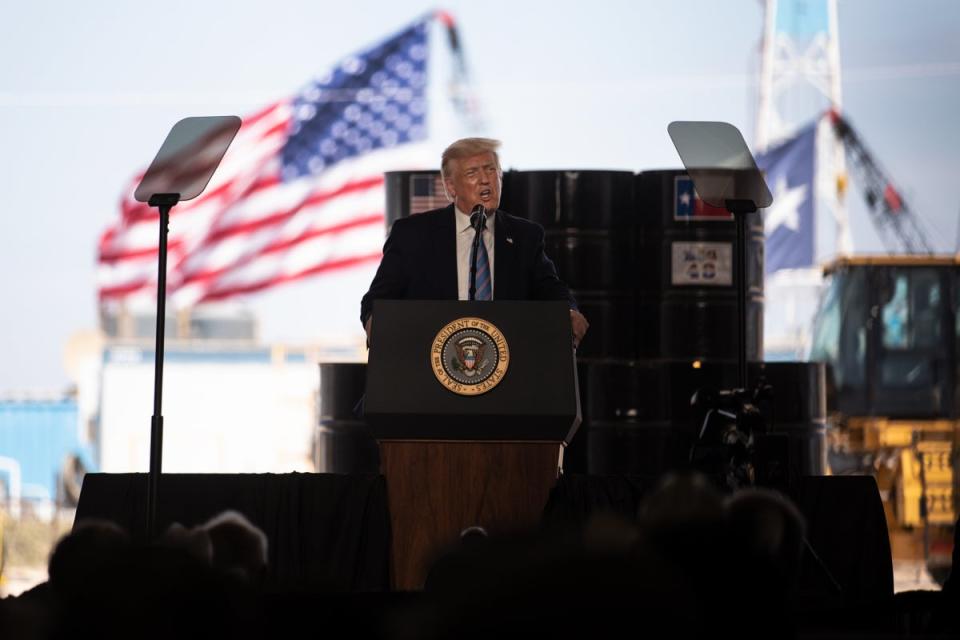 Trump speaks to city officials and employees of Double Eagle Energy on the site of an oil rig in Midland, Texas (Getty)