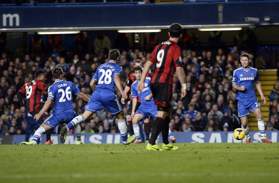 West Bromwich Albion's Stephane Sessegnon (L) scores against Chelsea during their English Premier League soccer match at Stamford Bridge in London November 9, 2013.