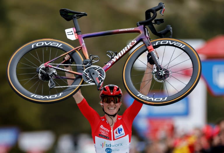 Dutch rider Demi Vollering celebrates after winning the women's Vuelta and eighth stage of the race on Sunday (OSCAR DEL POZO)