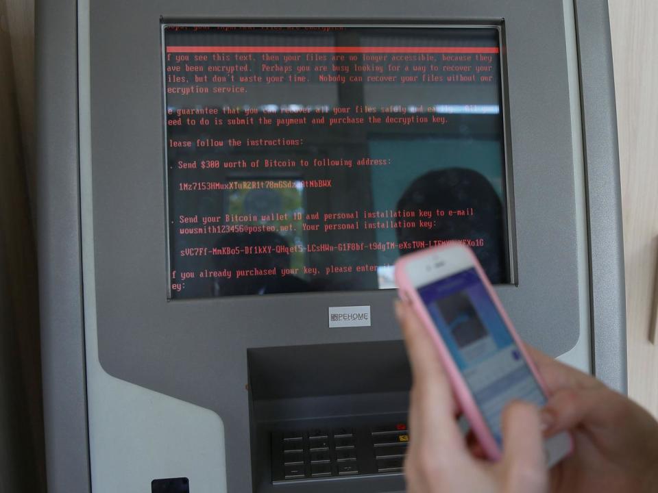 A message demanding money is seen on a monitor of a payment terminal at a branch of Ukraine's state-owned bank Oschadbank after a wave of cyber attacks, in Kiev, Ukraine, June 27, 2017. (Reuters)