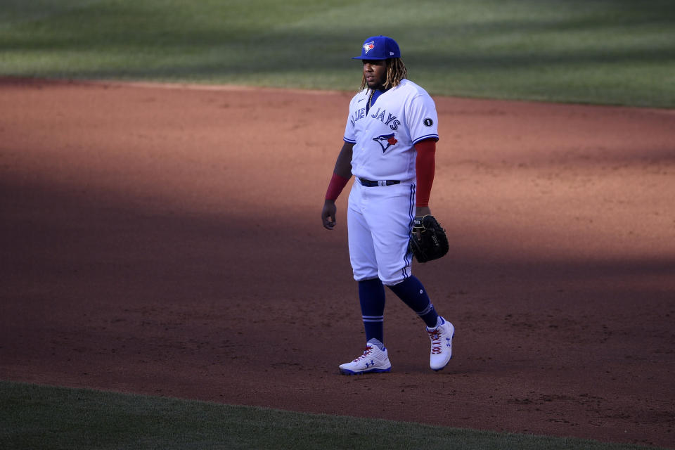 Toronto Blue Jays first baseman Vladimir Guerrero Jr. stands on the field during the third inning of a baseball game against the Washington Nationals, Wednesday, July 29, 2020, in Washington. (AP Photo/Nick Wass)