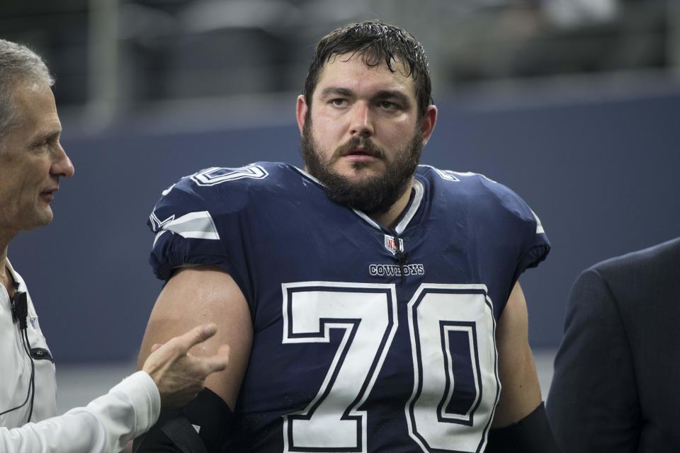 Nov 23, 2017; Arlington, TX, USA; Dallas Cowboys guard Zack Martin (70) leaves the game during the second quarter against the <a class="link " href="https://sports.yahoo.com/nfl/teams/la-chargers/" data-i13n="sec:content-canvas;subsec:anchor_text;elm:context_link" data-ylk="slk:Los Angeles Chargers;sec:content-canvas;subsec:anchor_text;elm:context_link;itc:0">Los Angeles Chargers</a> at AT&T Stadium. Mandatory Credit: Jerome Miron-USA TODAY Sports