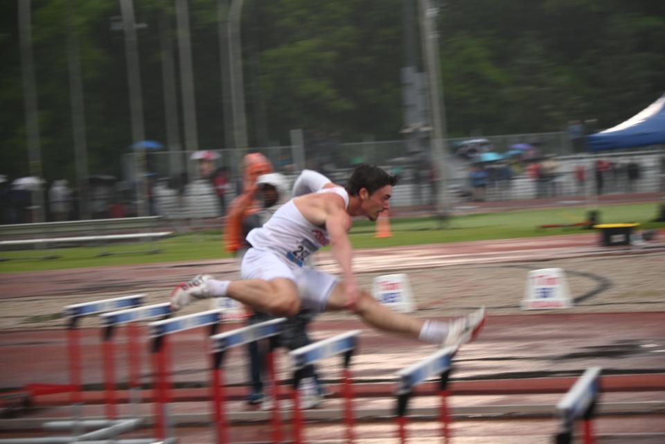 Fishers’ Tyler Tarter competes in the 300m hurdles during the IHSAA Boys State Track & Field Finals at the Robert C. Haugh Track & Field Complex on the campus of Indiana University in Bloomington on Saturday, June 1, 2024.