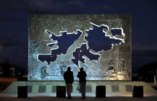 People visit the Malvinas Islands Monument in Ushuaia, Argentina, on April 1, 2012, the eve of the 30th anniversary of the South Atlantic war between Argentina and Britain over the Falkland Islands. Britain and Argentina on Monday marked 30 years since the invasion of the Falkland Islands triggered a 74-day war, with diplomatic tensions still running high