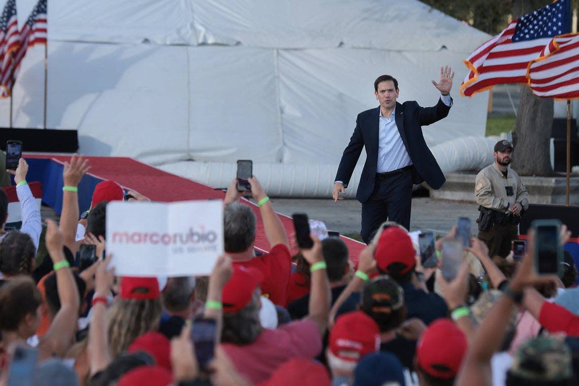 U.S. Sen. Marco Rubio waves to the crowd as he walks on stage to give his remarks at the Miami-Dade County Fair and Exposition on Sunday, November 6, 2022. Former President Donald Trump and a collection of other national and local Republicans campaigned with Rubio on the eve of the Nov. 8 election. Carl Juste/cjuste@miamiherald.com