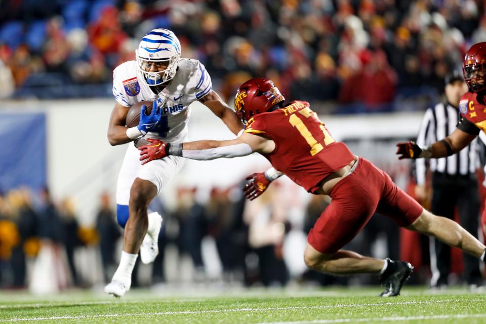 New UC running backs coach Sean Dawkins coached Blake Watson who had 1,152 yards for the Tigers and helped them to an AutoZone Liberty Bowl win over Iowa State last Dec. 29.