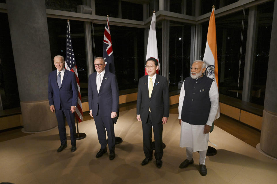 U.S. President Joe Biden, left, Prime Minister Anthony Albanese, second left, of Australia, Prime Minister Fumio Kishida, third left, of Japan and Prime Minister Narendra Modi of India, pose for a group photo during a Quad Leaders' meeting, on the sidelines of the G7 summit in Hiroshima, western Japan, Saturday, May 20, 2023. (Kenny Holston/Pool Photo via AP)