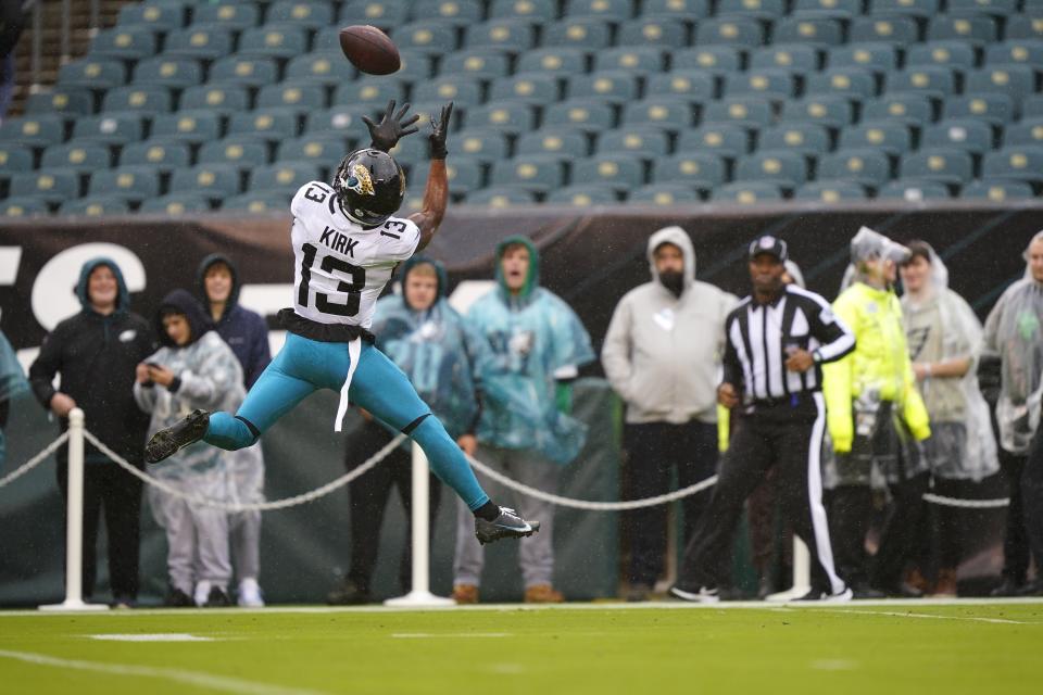 Jacksonville Jaguars' Christian Kirk warms up before an NFL football game against the Philadelphia Eagles on Sunday, Oct. 2, 2022, in Philadelphia. (AP Photo/Matt Rourke)