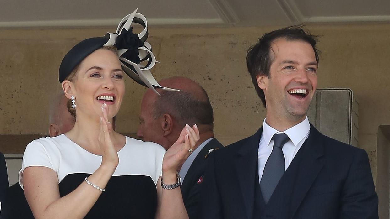 Kate Winslet and husband Ned Rocknroll attend the 'Prix de Diane Longines 2014' at Hippodrome de Chantilly on June 15, 2014 in Chantilly, France