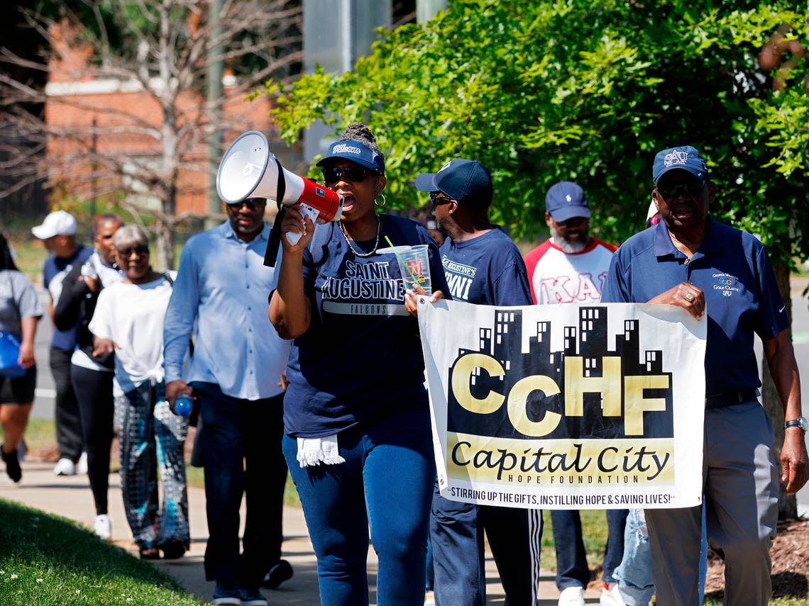 People march during a rally to save St. Augustine’s University in Raleigh, N.C. on Monday, April 29, 2024. The event was organized by the Capital City Hope Foundation, Falcons Unite, and the SAVESAU Coalition.