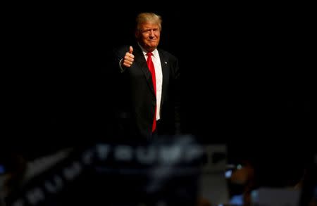 Republican U.S. presidential candidate Donald Trump arrives at a campaign rally in Eugene, Oregon, U.S., May 6, 2016. REUTERS/Jim Urquhart/File Photo