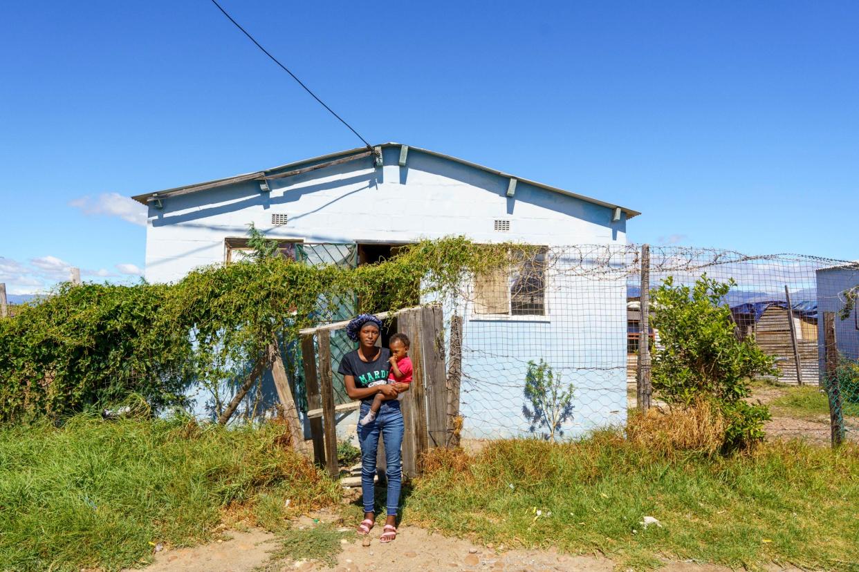 Venique Swartz with her one year old baby Nashrique, at their home in Avian Park