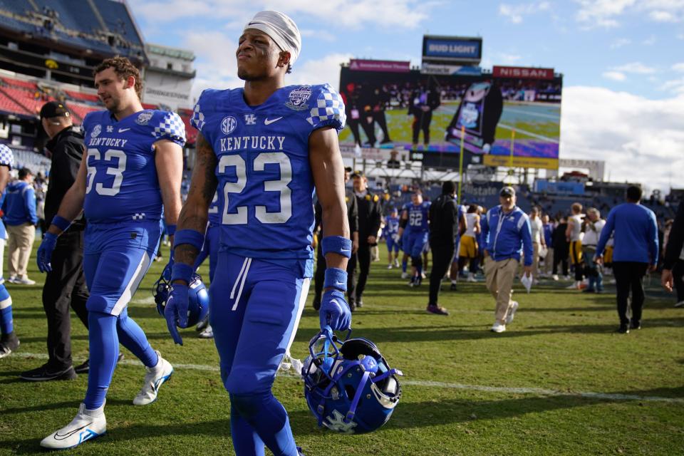 Kentucky defensive back Andru Phillips (23) exits the field after Iowa won the TransPerfect Music City Bowl at Nissan Stadium in Nashville, Tenn., Saturday, Dec. 31, 2022.

Musiccitybowl 123122 An 039